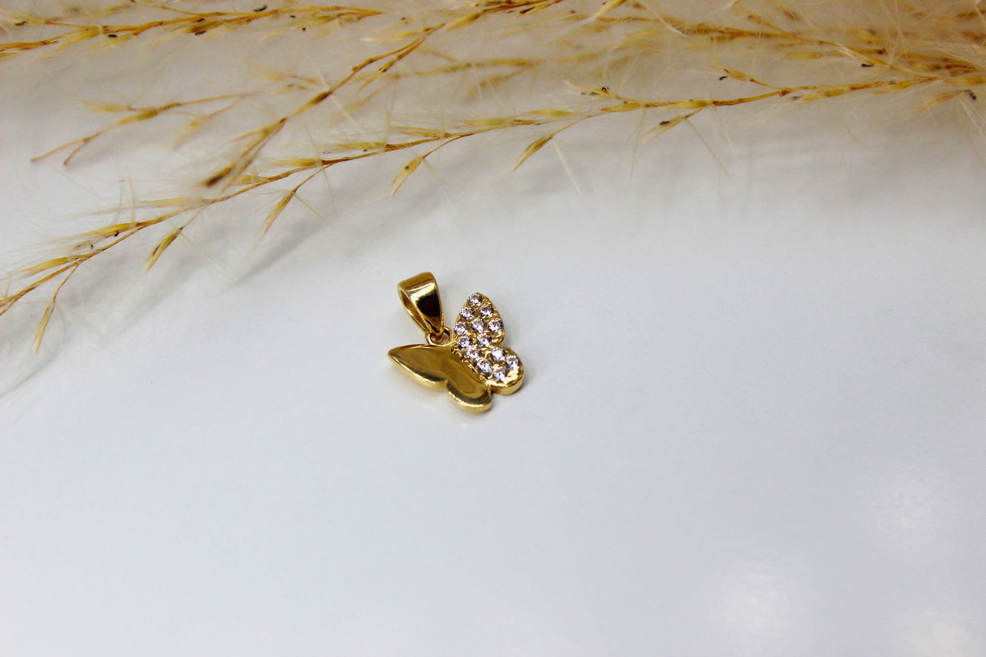 Schmetterling Gold-Anhänger aus 585 Gelbgold verziert mit Zirkonia Steinen -