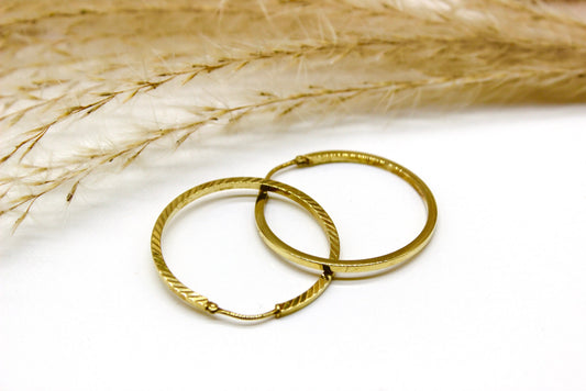 Geschliffene Creolen in 14K Gelbgold