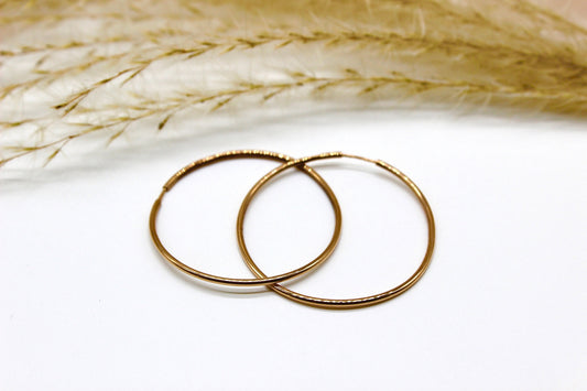 Schlichte Abgerundete Creolen in 14K Rotgold fein